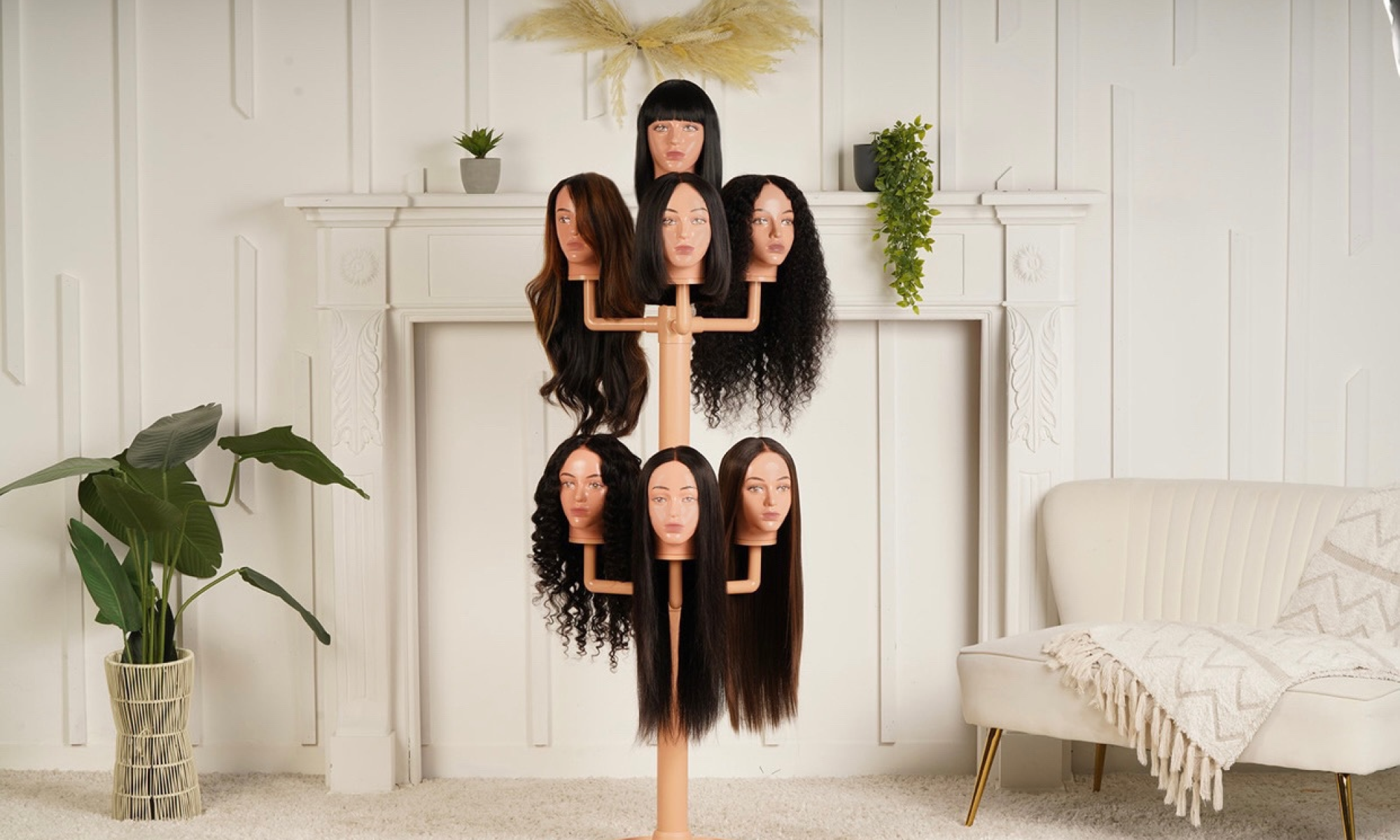 The wig hanger with 7 mannequin head worn with wigs in a living room.
